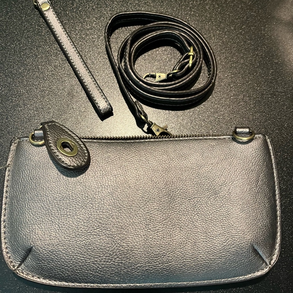 Silver Joy wallet with wrist strap & long strap.  In excellent condition.